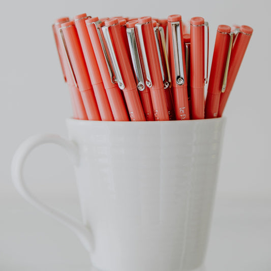 Two Coral Pink Pens