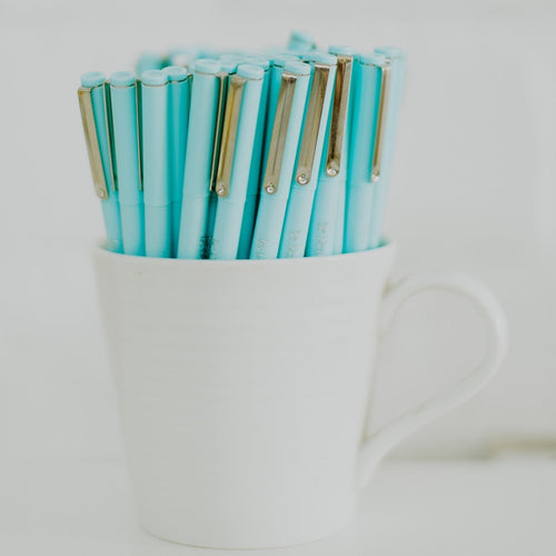 Two Pale Blue Pens
