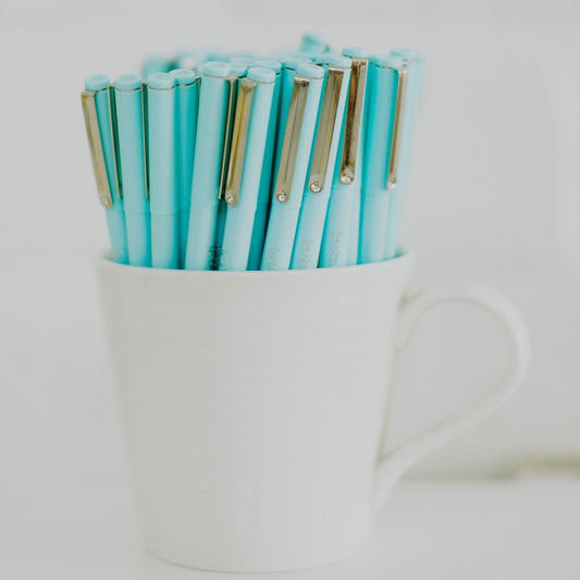 Two Pale Blue Pens